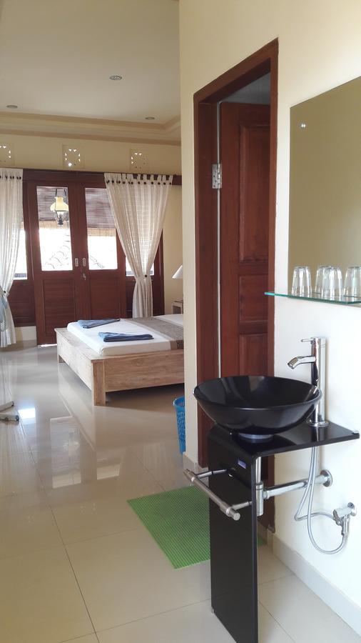 Three Ayu Family House Bed & Breakfast Ubud  Bagian luar foto